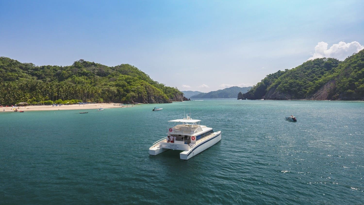 The catamaran in the bay of Isla Tortuga, from the air